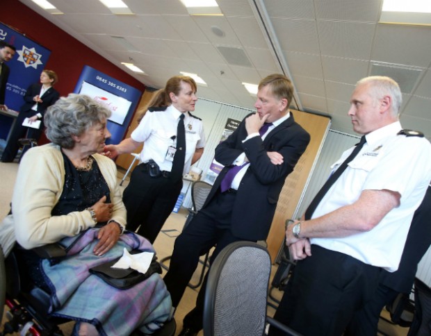 June Brown (service user), Ann Hazel and Andy Bruce (County Durham and Darlington Fire and Rescue Service) with Kris Hopkins (centre).